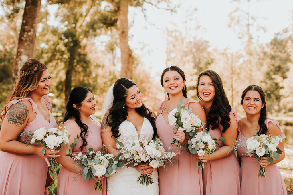 Bridal Party In Pink Holding Bouquets