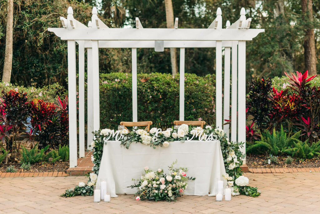 Bride And Groom Table Floral Arrangement