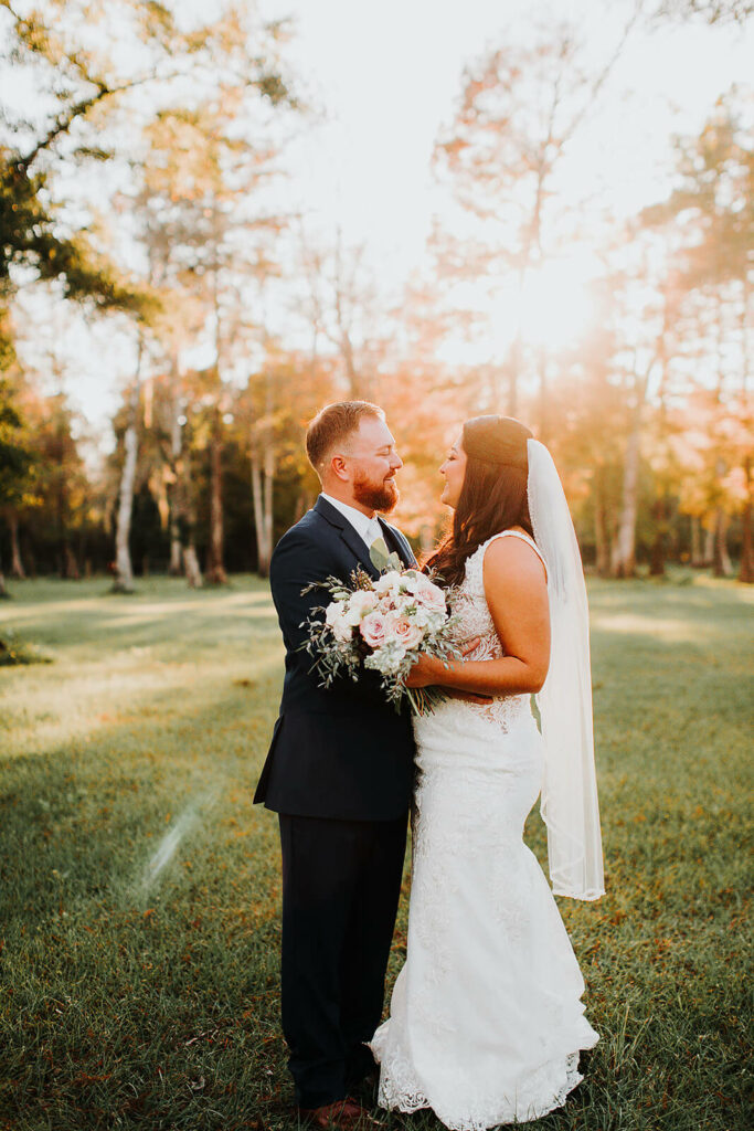 Bride And Groom WIth Elegant Floral Bouquet