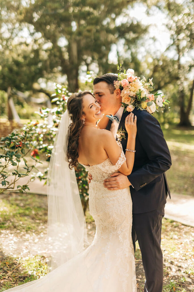 Bride And Groom With Wedding Florals