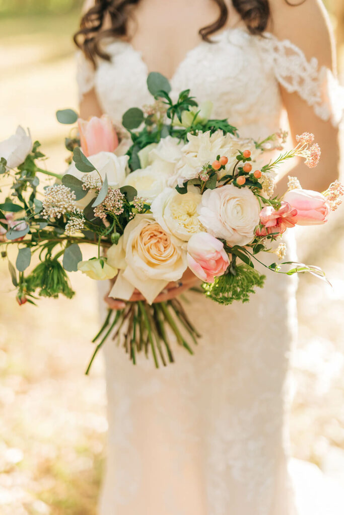 Bride Holding Light Pink And White Bouquet