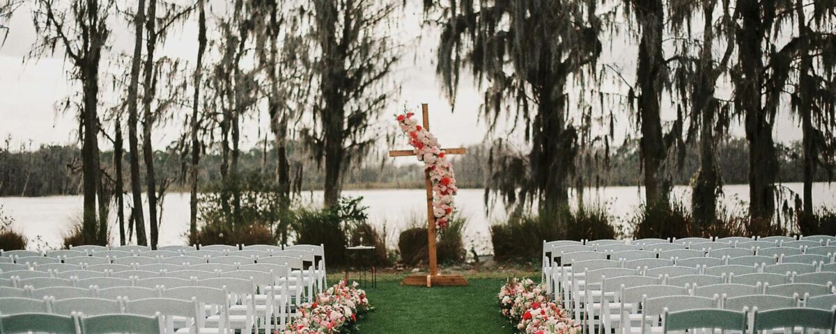 Wedding Cross With Vibrant Floral Arrangement