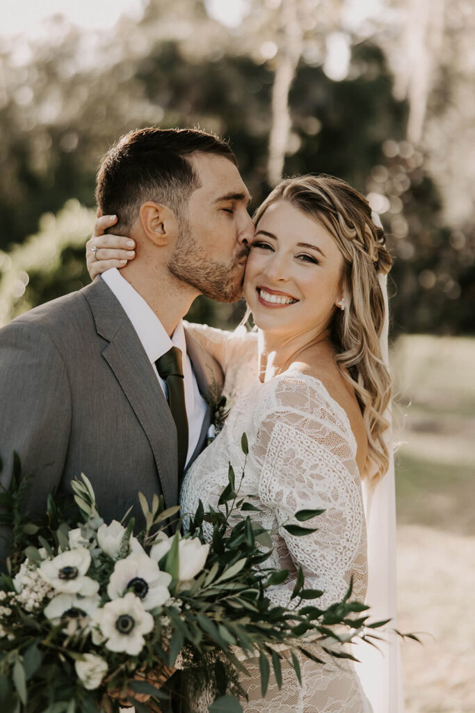 Bride and Groom With Farm Nine Wedding Bouquet