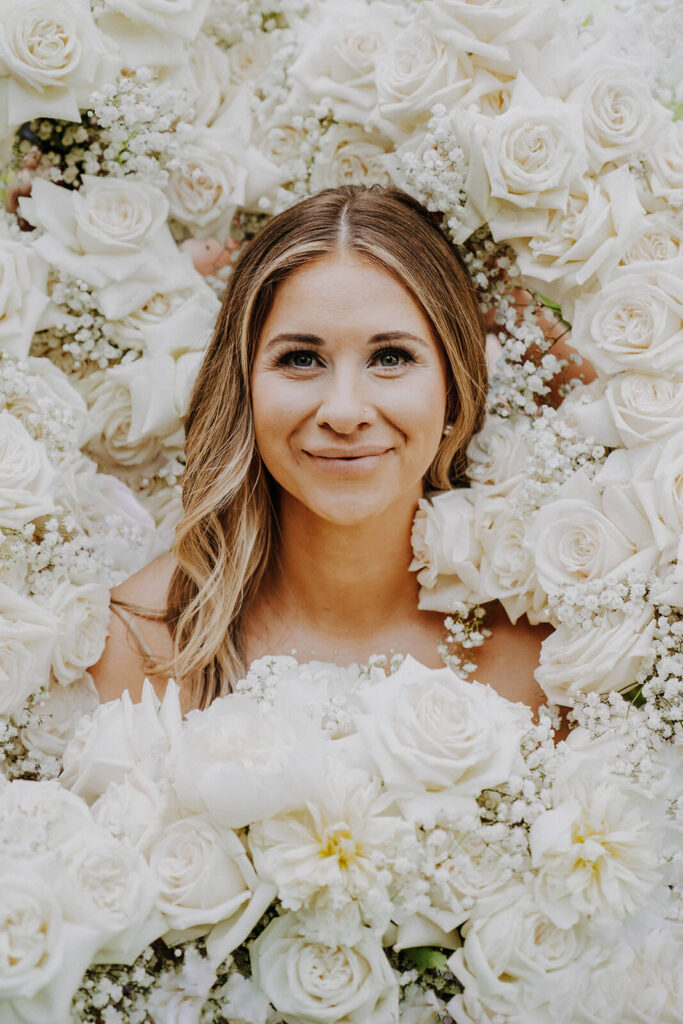 Bride Surrounded With Flowers